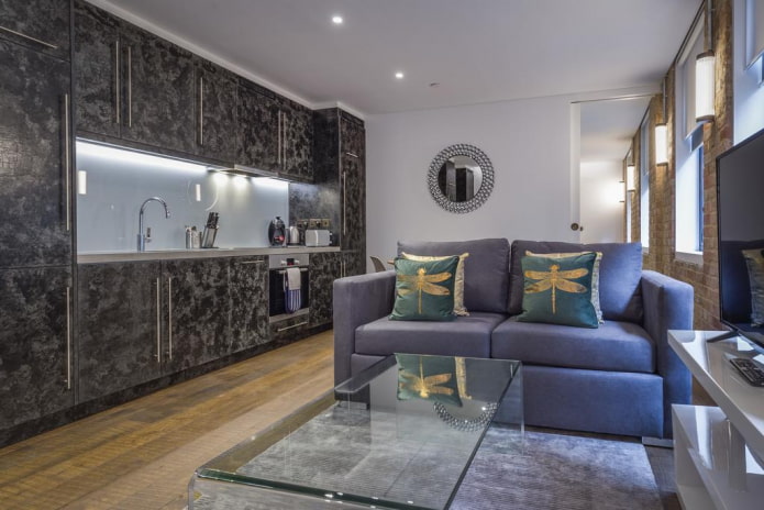 arrangement of furniture in a kitchen-living room of 17 square meters