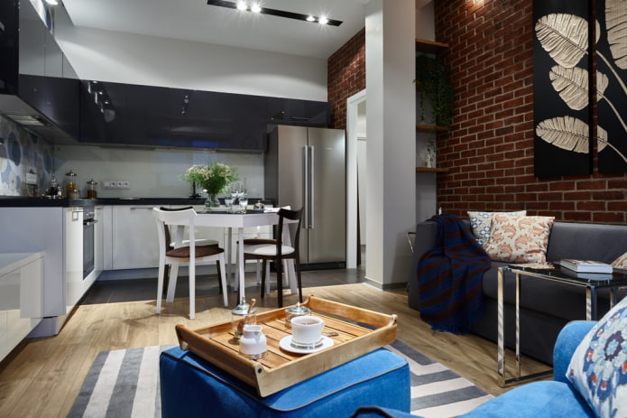 spacious combined kitchen-living room with corner furniture