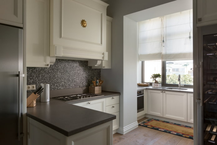 furniture in the interior of a kitchen combined with a loggia