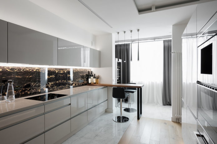 furniture in the interior of a kitchen combined with a loggia