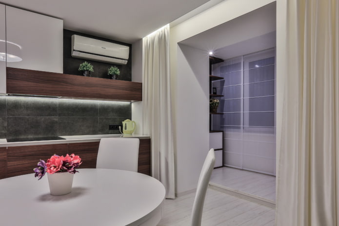 curtains in the interior of the kitchen combined with the loggia