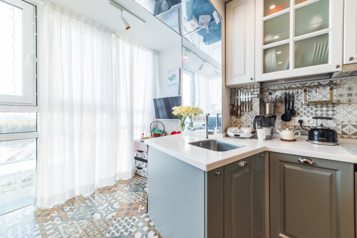 small kitchen combined with a balcony