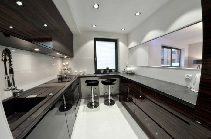 small kitchen with a bar counter by the window