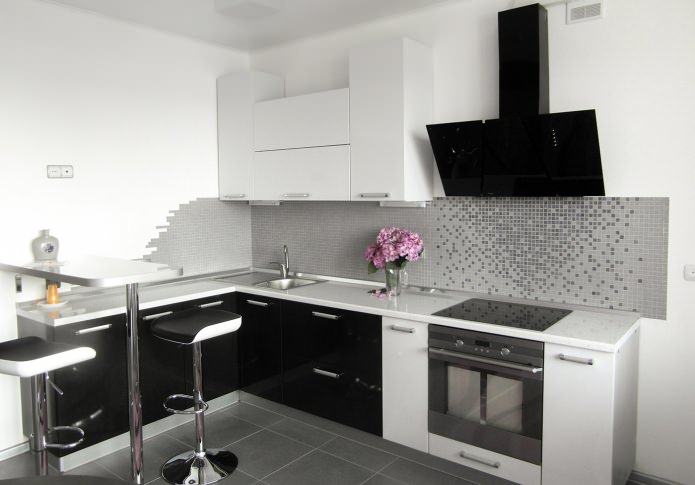 Design of a corner kitchen with a bar counter