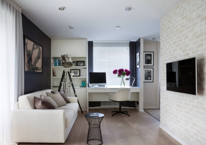 workplace in the interior of a studio apartment of 35 square meters