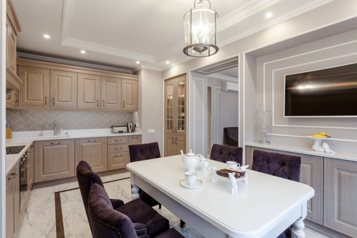 Kitchen in a one-room apartment in a classic style
