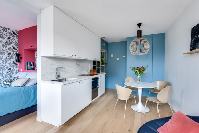 design of the kitchen area in a studio apartment