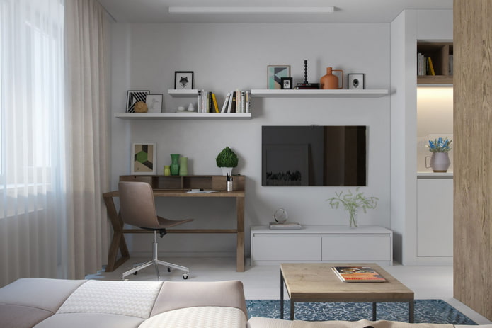 design of a work area in the interior of a studio apartment