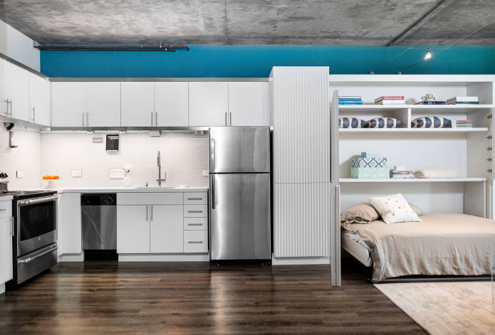 Elongated loft studio and a transforming bed