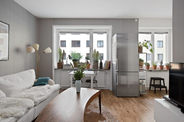 studio apartment interior with two windows