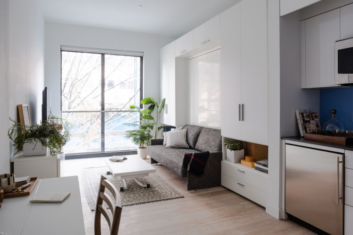 studio apartment interior with one window