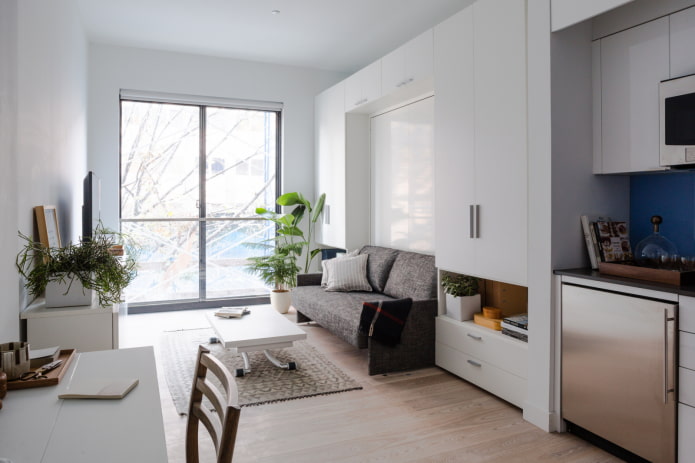 studio apartment interior with one window