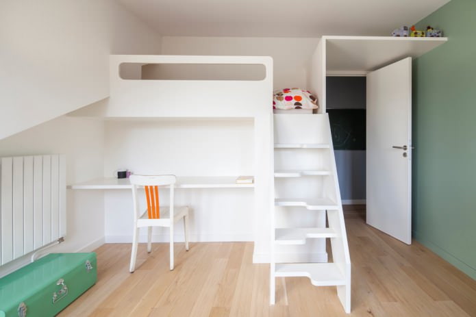 combined table and bed in a children's room in white