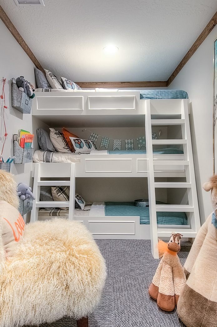 children's room with a three-tier bed