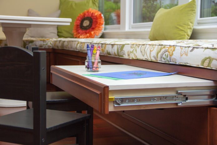 pull-out table in the nursery