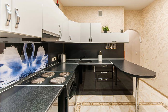 small corner kitchen with a bar counter