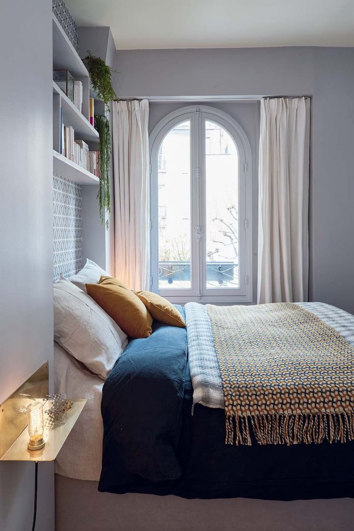 shelves above the bed