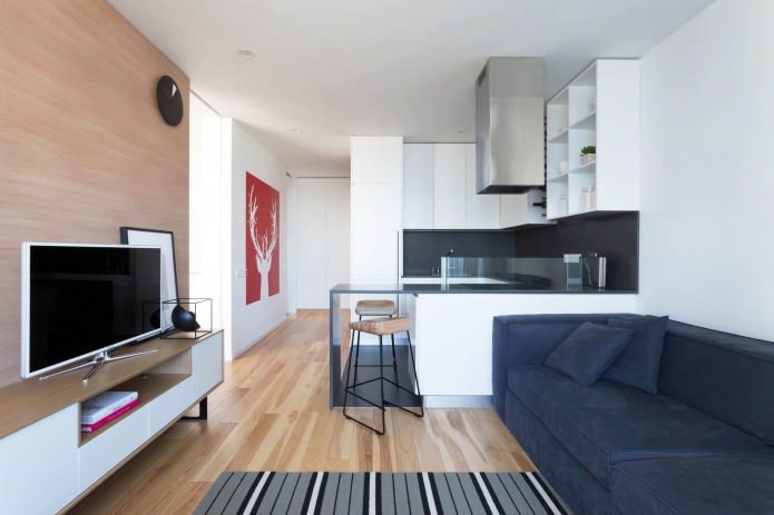 kitchen-living room design with a bar counter