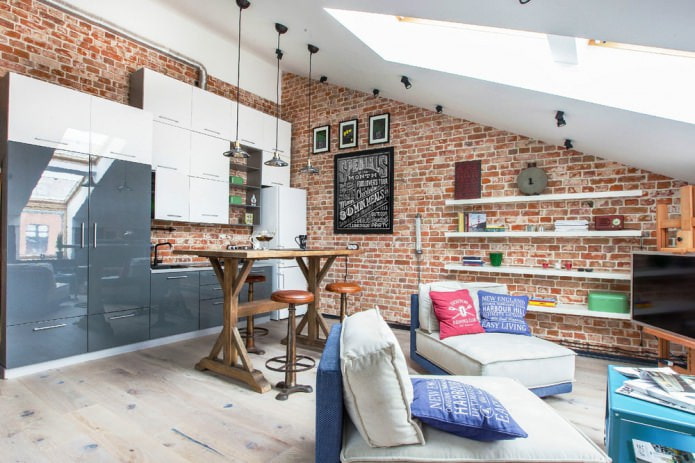 Red brick in the interior of a studio apartment