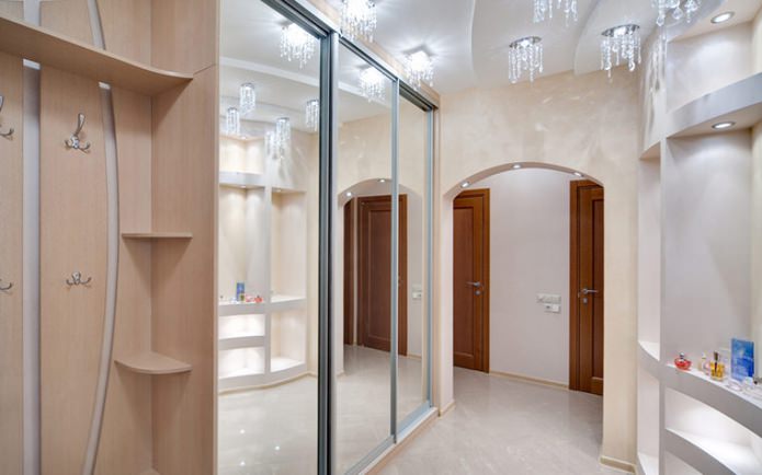 arch in the hallway with built-in spotlights