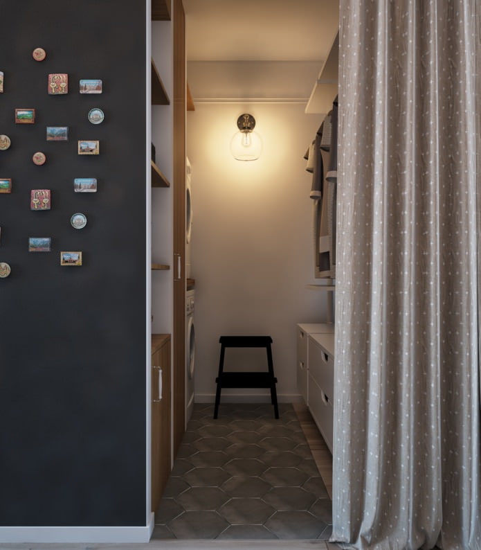 Design of a dressing room in a one-room apartment with a swing-out design