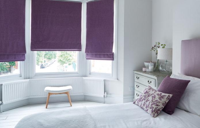 purple roman blinds in the bedroom