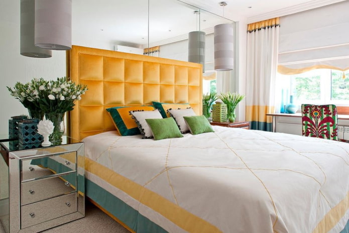 Mirror on the wall at the headboard