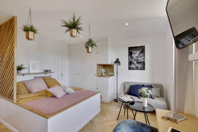 Bedroom with a small sofa