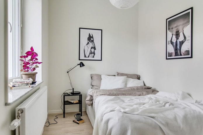 laconic nightstand with a lamp in the bedroom