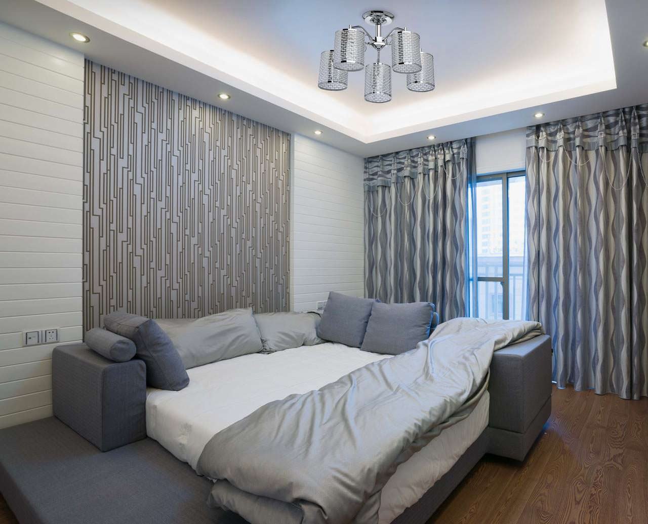 gray curtains in the design of the bedroom with gray wallpaper