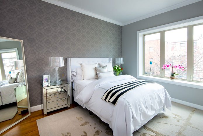 Gray walls in the bedroom in a Scandinavian style