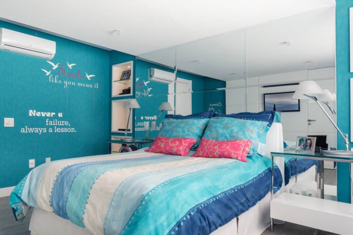 mirror panels on the wall in the blue bedroom