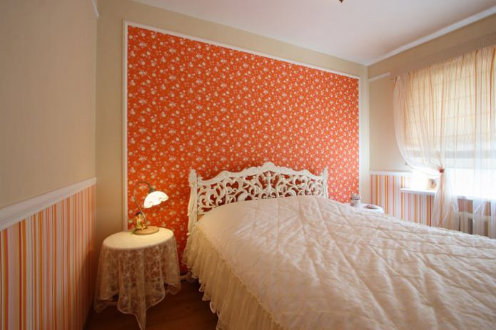orange accent wall in the bedroom