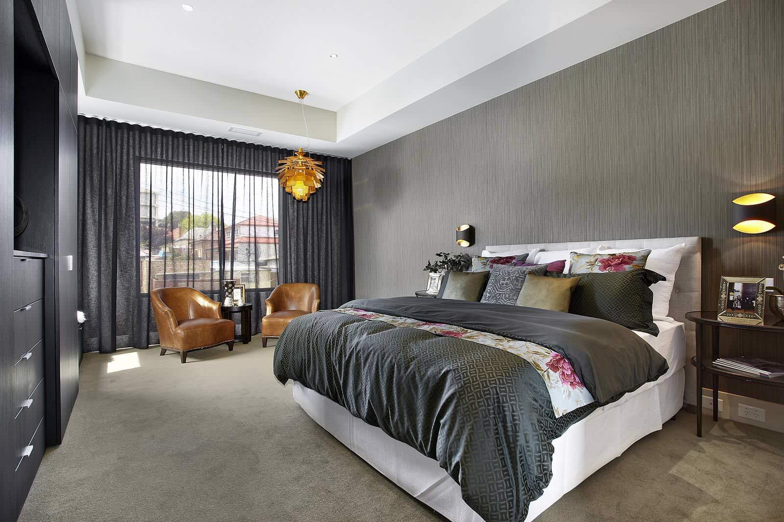 gray curtains in the design of the bedroom with gray wallpaper