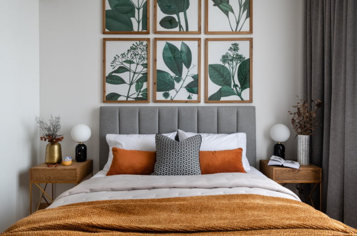 posters in the bedroom above the bed