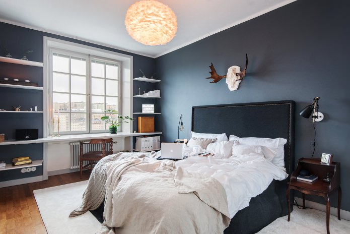 Dark gray walls in the bedroom 