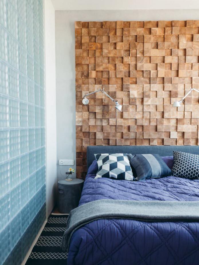 Modern bedroom with a wooden wall