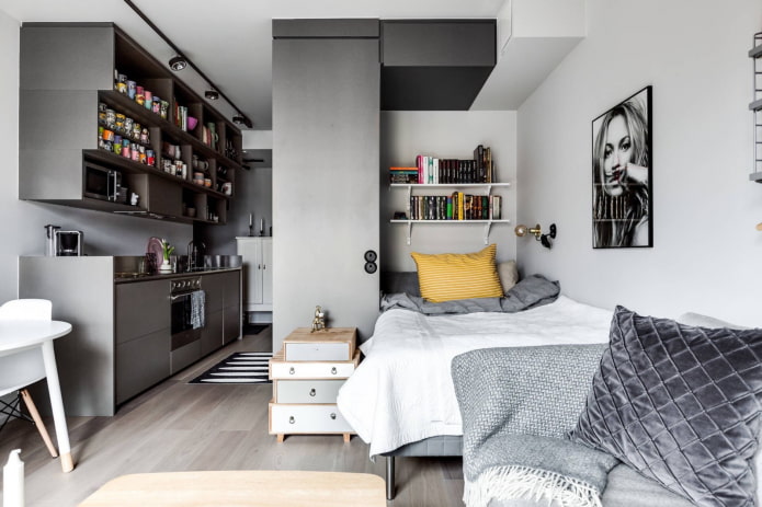 Grey studio with a niche