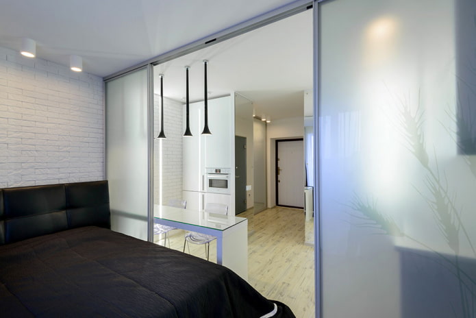 sleeping area in the interior of a studio apartment