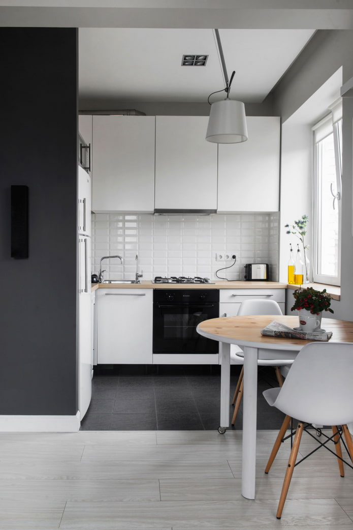 kitchen area in the interior of a studio apartment