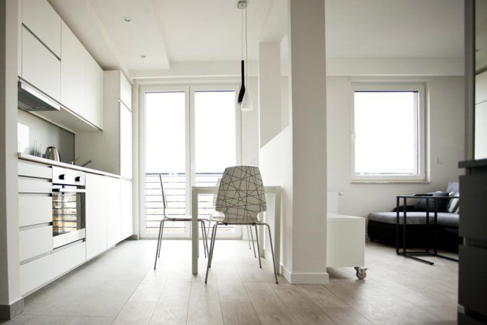 studio apartment interior with two windows
