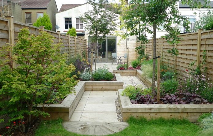 narrow area with a wooden fence