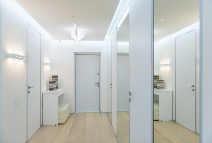 bright hallway with large mirrors