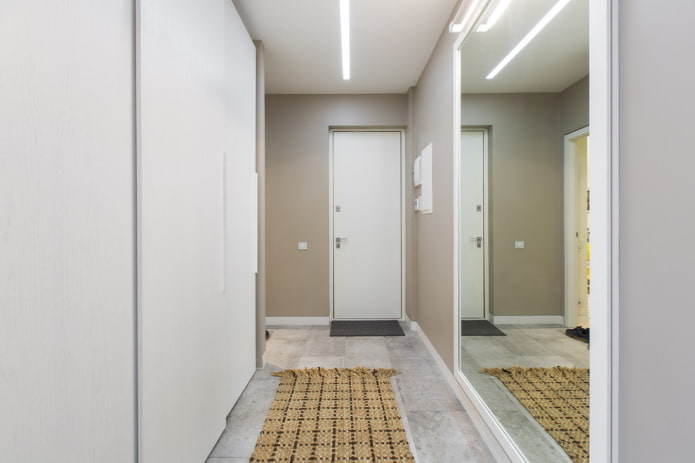 hallway with a large mirror