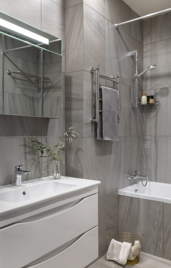gray tiles for the walls in the bathroom