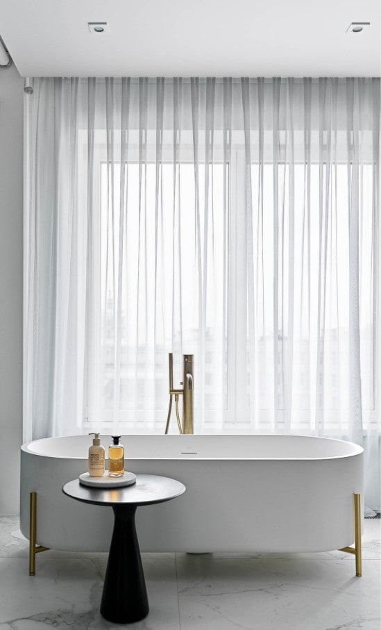 bathroom with a large window