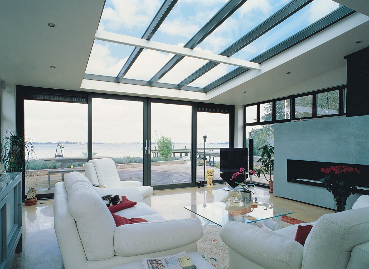 interior of the living room in a country house with panoramic windows
