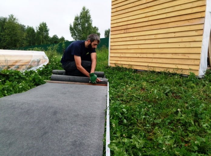 path between beds made of roofing felt