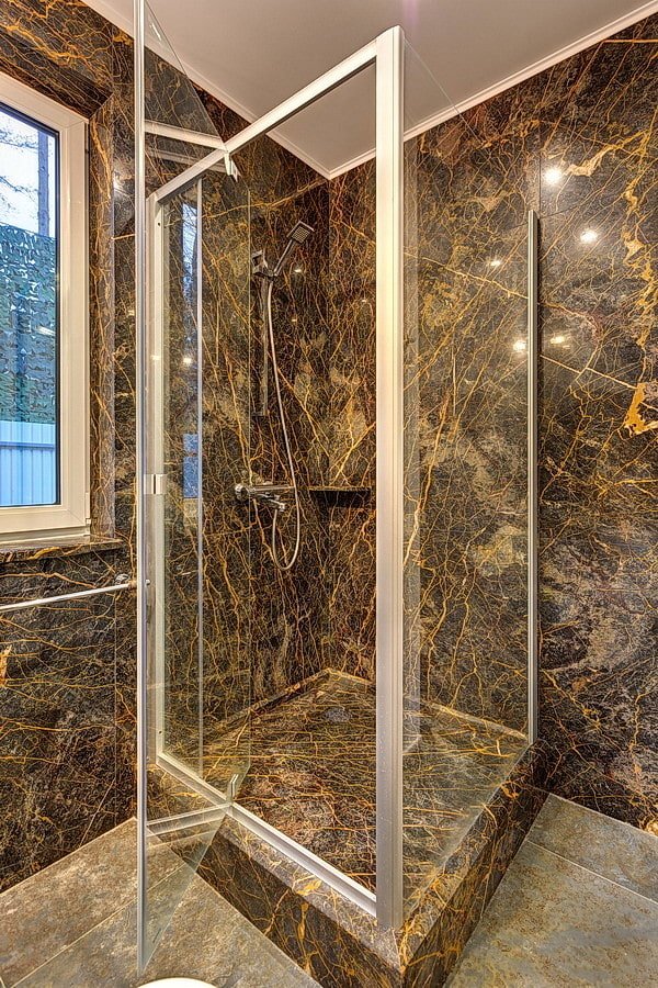 stone tiles in the shower in the interior
