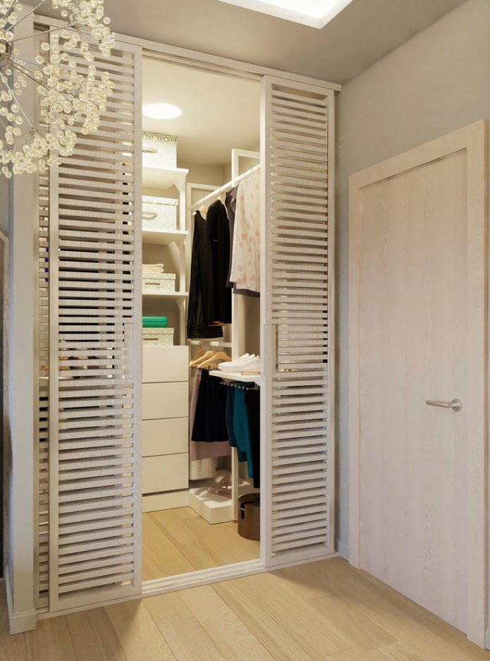 dressing room with louvered doors in the interior
